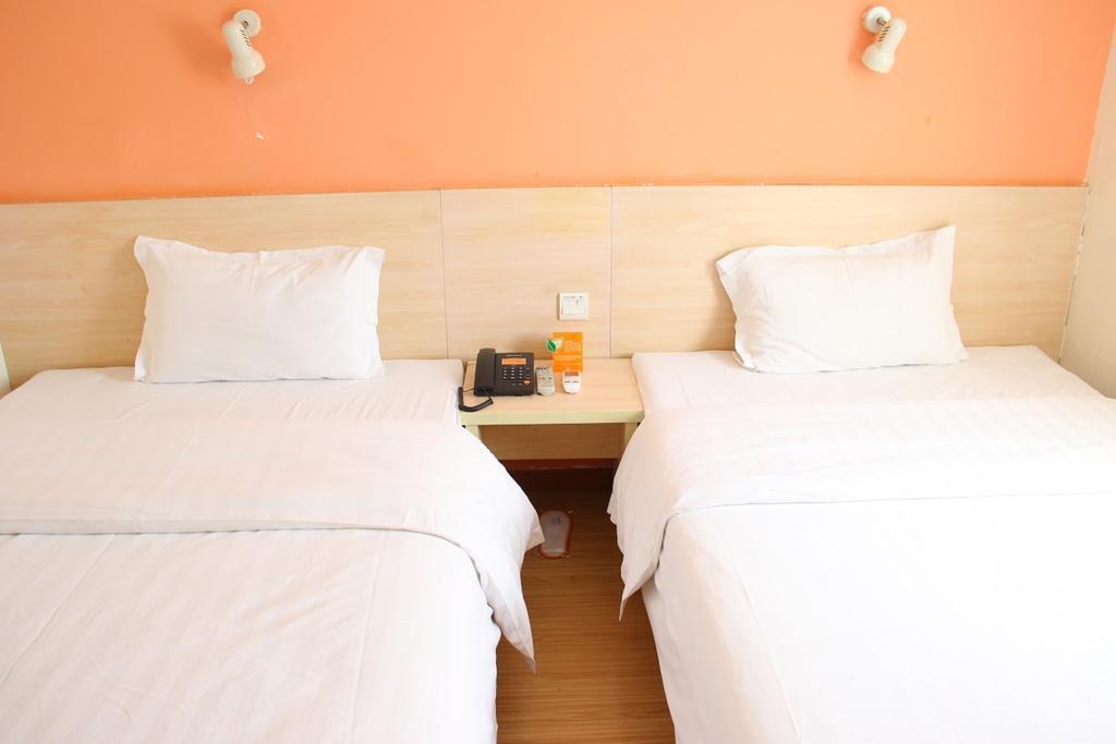 7Days Inn Dalian Gangwan Square Station Port Стая снимка